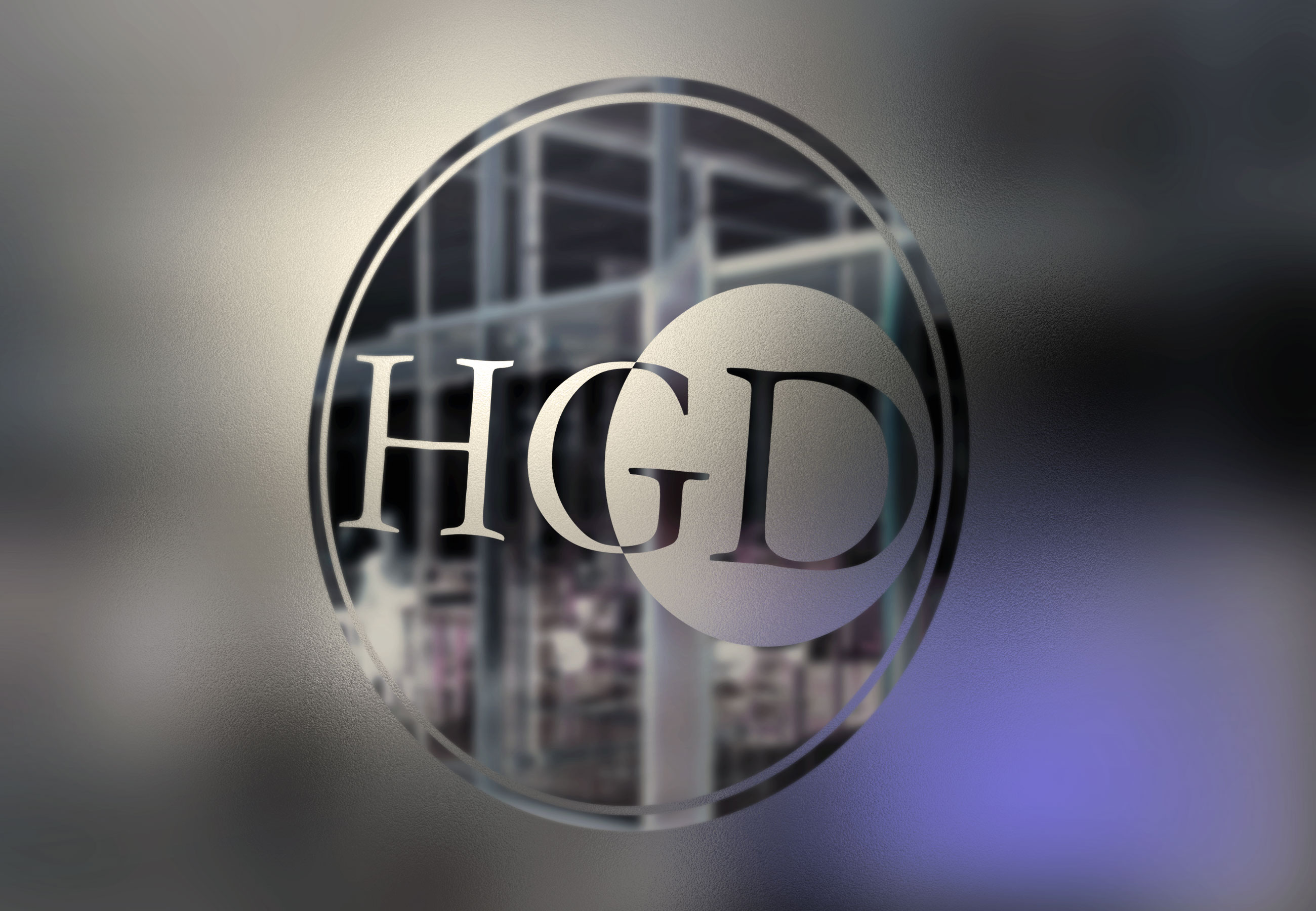 HGD Hibert Group Deutschland Emblem auf Glasfassade